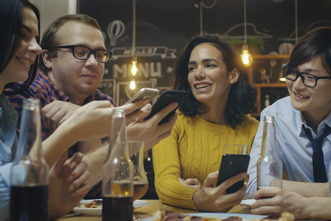DIRECTV FOR BUSINESS - friends using app at the bar